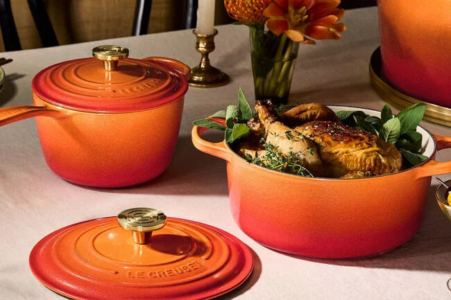 A whole chicken that has been cooked in a Le Creuset Flamme Doree Dutch Oven