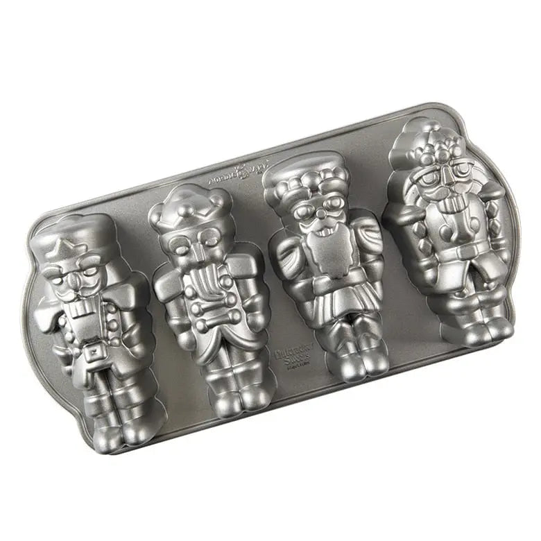 http://brownskitchen.com/cdn/shop/files/Nordic-Ware-Nutcracker-Cakelet-Pan-Nordic-Ware-1687300961335.jpg?v=1687300979