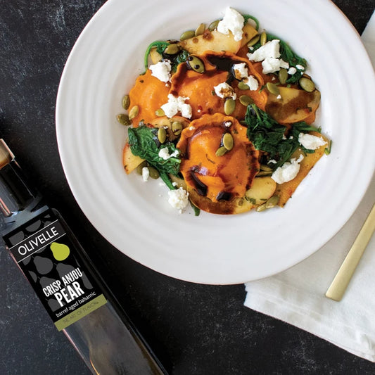 Squash Ravioli With Sauteed Apples And A Pear Balsamic Drizzle